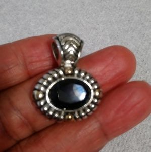 Vintage black onyx sterling silver pendant.